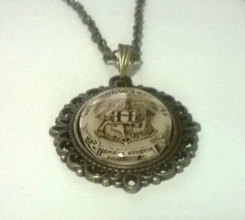 Медальйон Harry Potter Hogwarts 4х3 см. Медальйон Harry Potter Hogwarts 4х3 см.