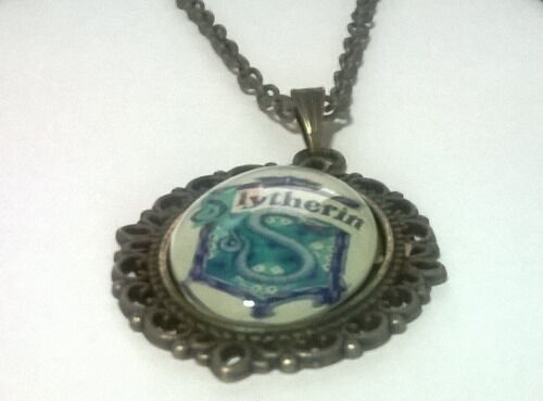 Медальйон Harry Potter Slytherin 4х3 см. Медальйон Harry Potter Slytherin 4х3 см.